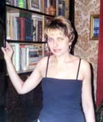 Алла Татаренко з улюбленими книгами.